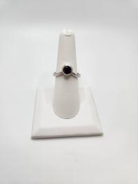 Curved Solitaire Bezel Garnet Ring by RYAN EURE