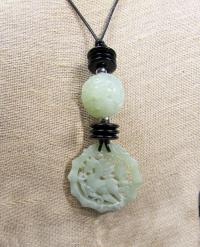 Mint Green Carved Jade Necklace by DIANA KAHLENBERG
