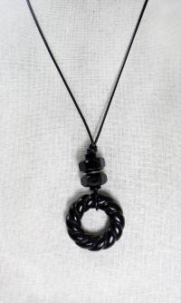 Carved Black Onyx Necklace by DIANA KAHLENBERG